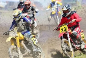 Two people motocross racing
